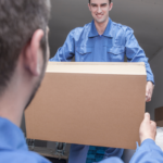 man lifting box
