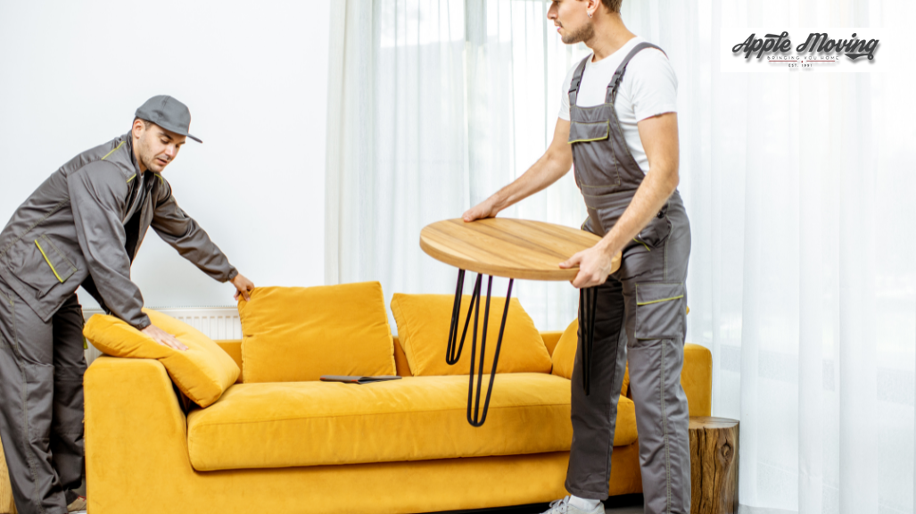 man lifting furniture